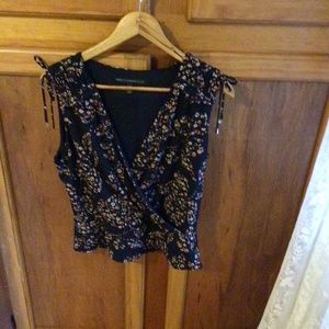 White House Black Market sleeveless blouse, size Medium.